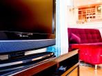 60inch TV with HBO and additionally Apple TV