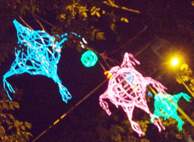 Pinatas of Christmas lights decorate the city!