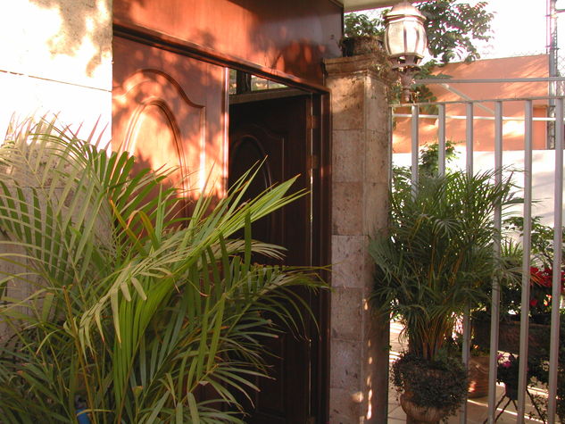 Front of house entrance after security gate.