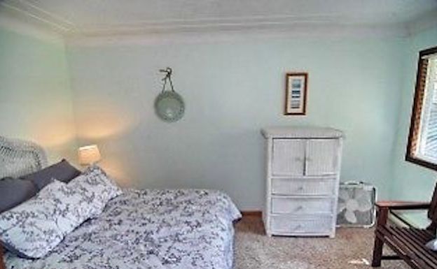 Beach Themed Bedroom With Queen Size Bed