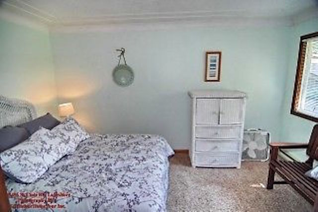 Beach Themed Bedroom With Queen Size Bed