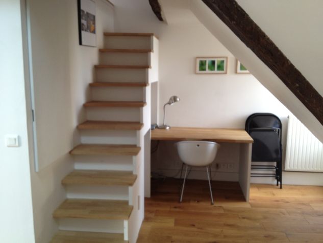 The stairs to the mezzanine and office corner