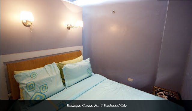 Double Bed with Pillows and Linens.