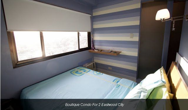 Double Bed with Pillows and Linens.