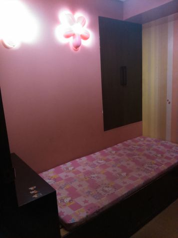 Single bed with built in closet and table