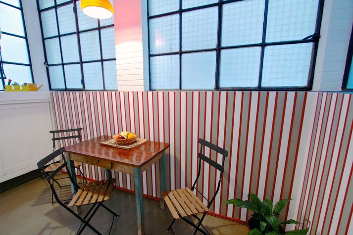 Open up the windows in the breakfast room and let the outdoors in.