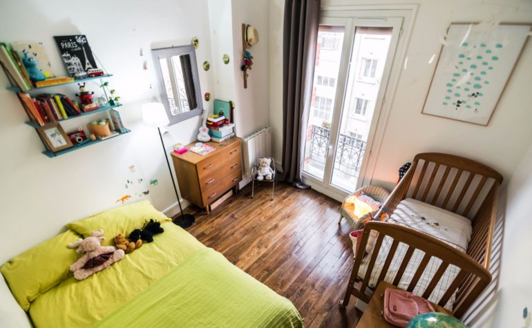 Paris Apartment Rental, Vacation in Paris
Relax after a long day of exploring in this charming bedroom, with a view of the rue de la Fontaine au Roi. #ParisApartmentRentals