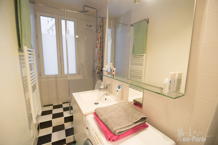 Paris Apartment Rental, Vacation in Paris
Bathroom is equipped with shower, sink, mirror, toilet and washing machine. #ParisApartmentRentals