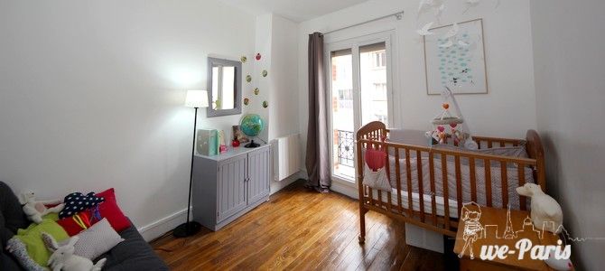 Paris Apartment Rental, Vacation in Paris
Relax after a long day of exploring in this charming bedroom, with a view of the rue de la Fontaine au Roi. #ParisApartmentRentals