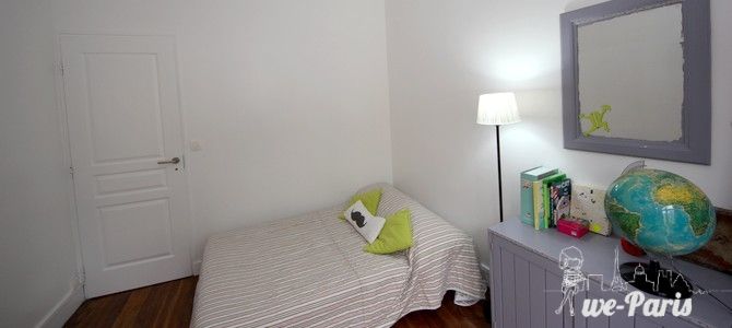 Paris Apartment Rental, Vacation in Paris
Relax after a long day of exploring in this charming bedroom, with a view of the rue de la Fontaine au Roi. #ParisApartmentRentals