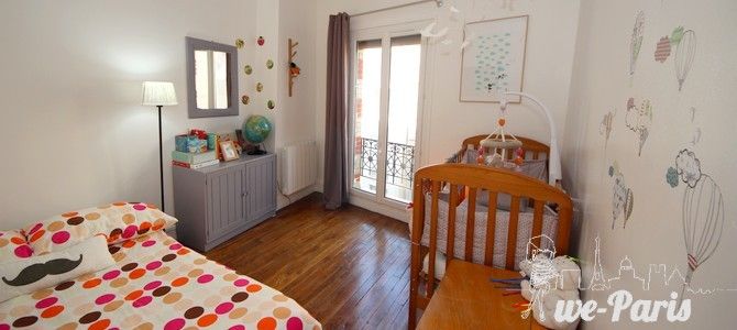 Paris Apartment Rental, Vacation in Paris
Relax after a long day of exploring in this charming bedroom, with a view of the rue de la Fontaine au Roi. #ParisApartmentRentals