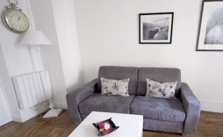 Paris Apartment Rental, Vacation in Paris
Sit down and relax after a long day of exploring Paris in this cozy Living Room / Kitchen. 