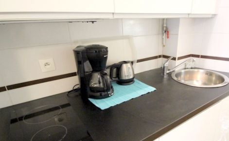 Paris Apartment Rental, Vacation in Paris
Sit down and relax after a long day of exploring Paris in this cozy Living Room / Kitchen. 