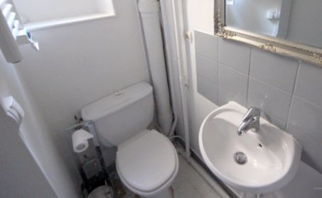 Paris Apartment Rental, Vacation in Paris
Sit down and relax after a long day of exploring Paris in this cozy Living Room / Kitchen. 