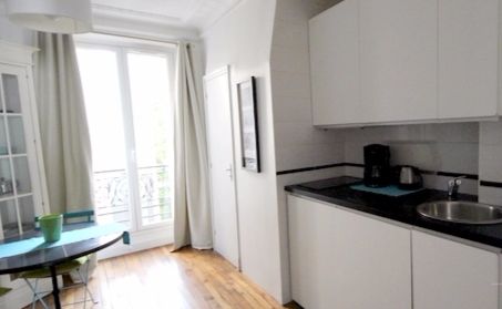 Paris Apartment Rental, Vacation in Paris
Sit down and relax after a long day of exploring Paris in this cozy Living Room / Kitchen. 