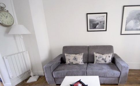 Paris Apartment Rental, Vacation in Paris
Sit down and relax after a long day of exploring Paris in this cozy Living Room / Kitchen. 