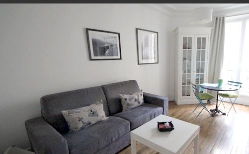 Paris Apartment Rental, Vacation in Paris
Sit down and relax after a long day of exploring Paris in this cozy Living Room / Kitchen. 