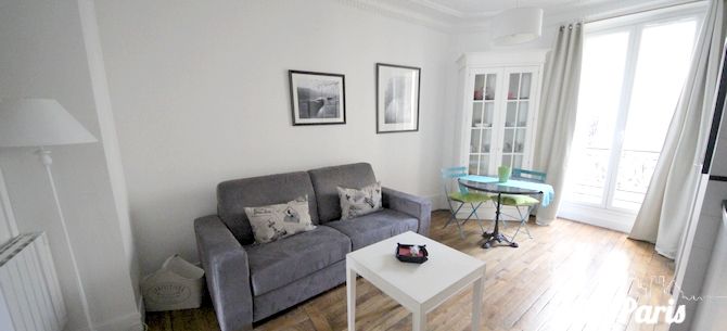 Paris Apartment Rental, Vacation in Paris
Sit down and relax after a long day of exploring Paris in this cozy Living Room / Kitchen. 