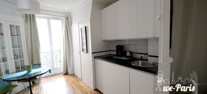 Paris Apartment Rental, Vacation in Paris
Sit down and relax after a long day of exploring Paris in this cozy Living Room / Kitchen. 