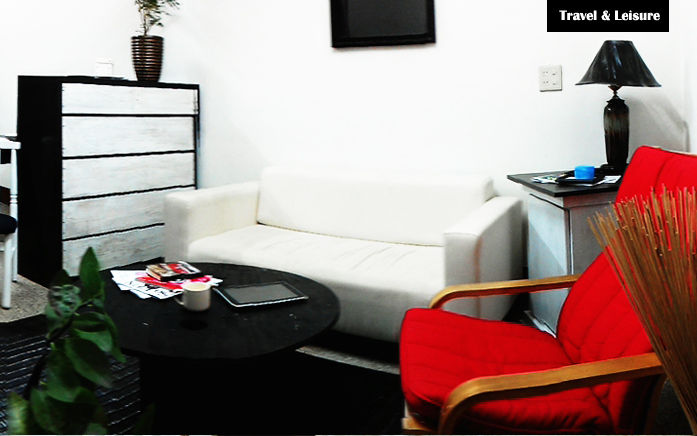 Sofa, chairs and shelves in our living room