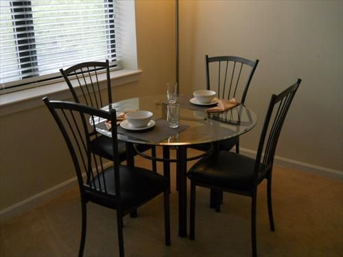 Dining area with seating for four where you can dine in comfort.