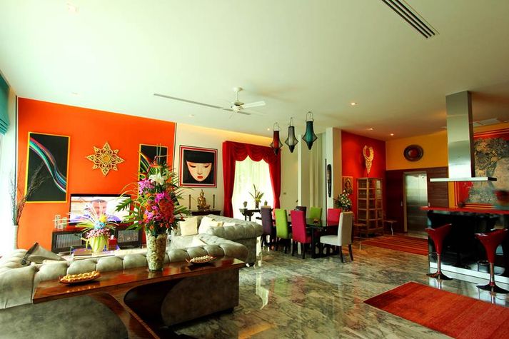 Spacious living area with a large smart TV