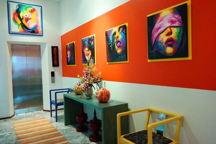 Interior design both modern and traditional Asian paintings and sculptures