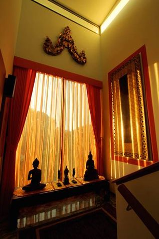 Interior design both modern and traditional Asian paintings and sculptures