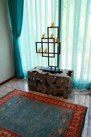 Interior design both modern and traditional Asian paintings and sculptures