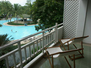 Balcony overlooking the pool and garden