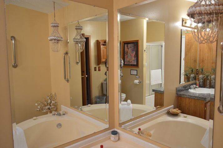 ...and a large corner tub to soak in by candlelight!