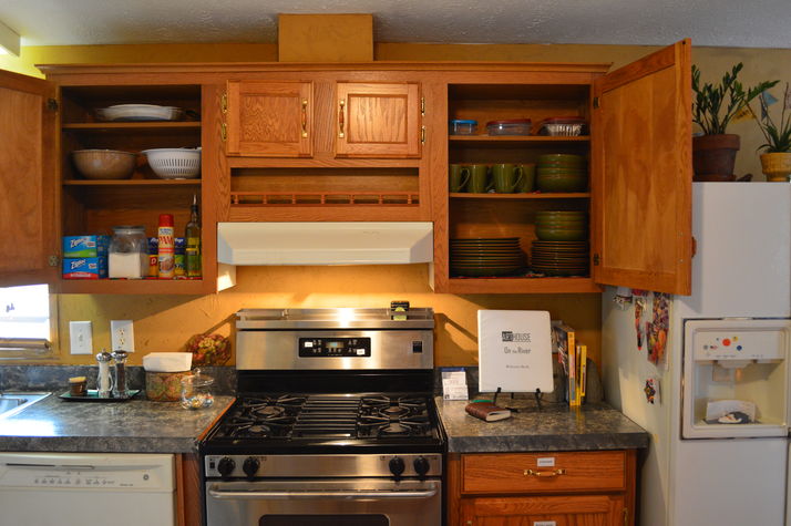 Gas Stove, Coffe cups, Dinner, Salad Plates and Bowls for 10, Colander, Baking dishes, plastic bags, sugar and olive oil