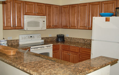 Well Appointed Kitchen Area with Granite Counter Tops