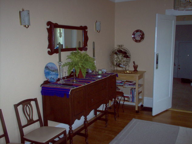 Place settings for 50 in the antique sideboard