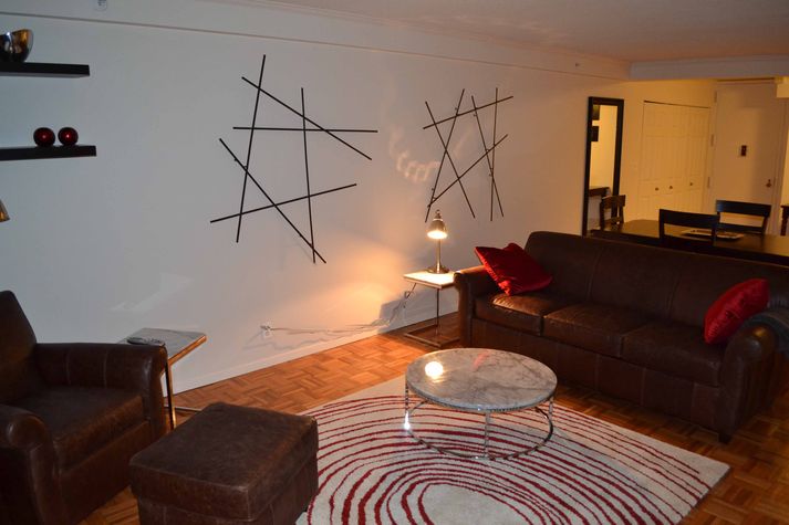 Modern marble coffee table and end tables, leather seating