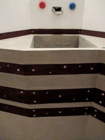 Industrial modern concrete and wood sink.