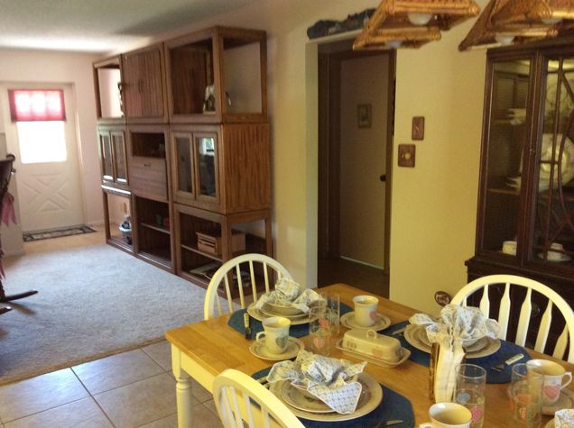 Looking at front entrance from Kitchen.