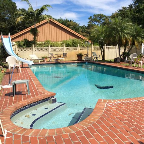 Large, deep oversized Pool with Slide & Diving Board for hours of fun!