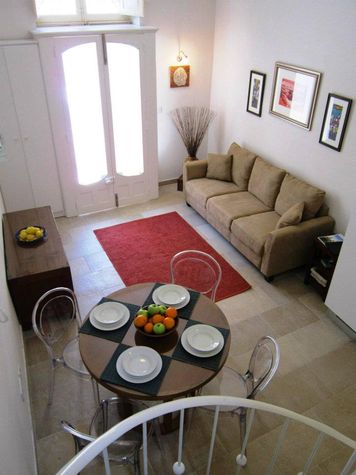 The living room is combnined with the kitchen-dining room
