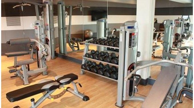 Large fitness center with cardio and weight machines