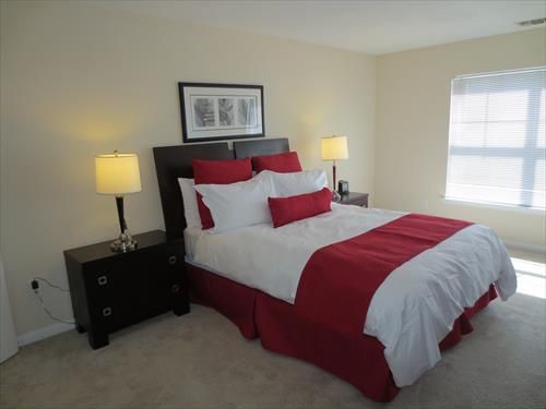 Master bedroom with en-suite bathroom, queen size bed and walk-in closet