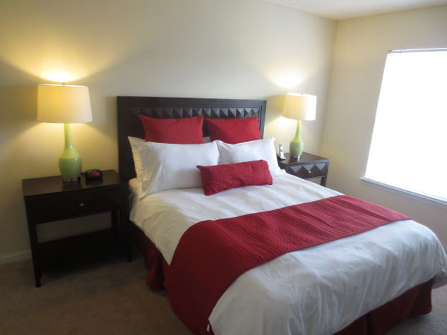 Spacious second bedroom with queen size bed and large closet