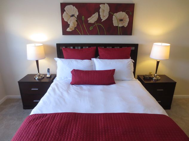 Master bedroom with en-suite bathroom, queen size bed and walk-in closet