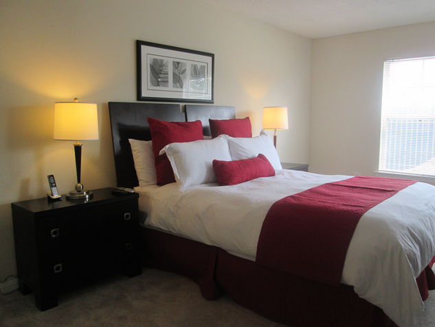 Spacious second bedroom with queen size bed and large closet