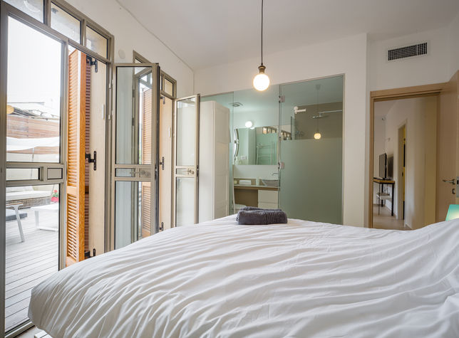 Master bedroom with a private exit to the garden