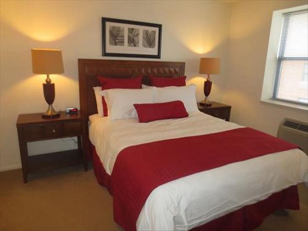 Master bedroom with en-suite bathroom, queen size bed and walk-in closet