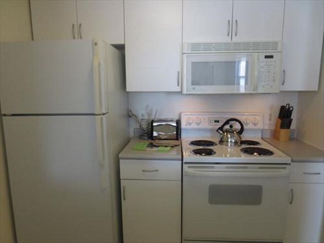 Fully equipped kitchen with full size appliances, pots, pans and dishes