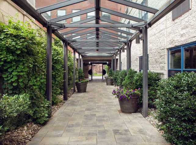Landscaped alley leading to the lobby