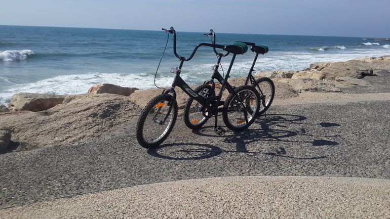 2 city bicycles on Tel Aviv's promenade