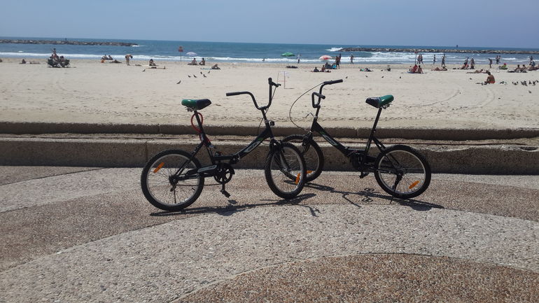 2 city bicycles on Tel Aviv's promenade
